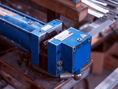 Production of PVC windows, press for biting unnecessary partsの写真素材