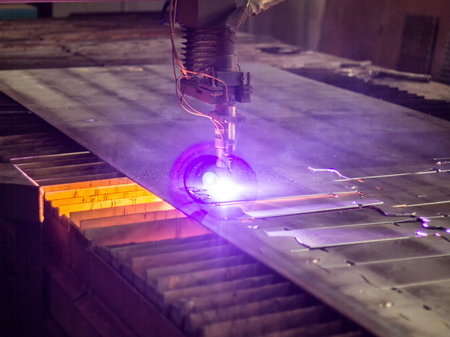 Bench for modern automatic plasma laser cutting of metals, plasma cutting with laser and laser, close-upの写真素材