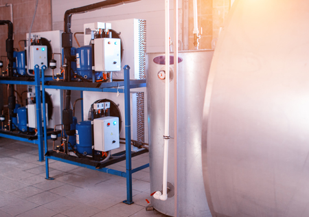 Equipment on the farm for processing, storing and cooling cow's milk, producing cow's milk, storage tank for cow milk, reservoirの写真素材