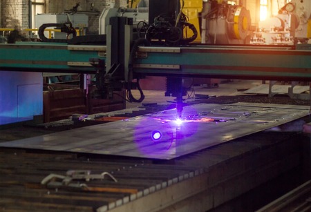 Bench for modern automatic plasma laser cutting of metals, plasma cutting with laser and laser, toolの写真素材