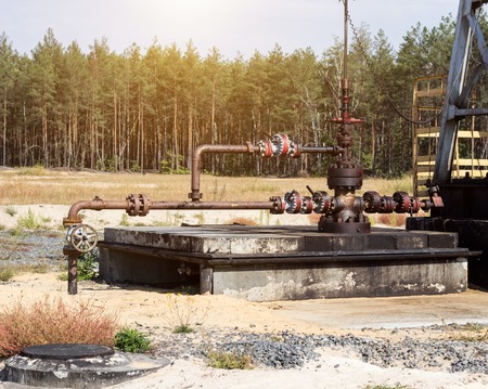Equipment for oil and gasoline production, cranes and gate valves blocking the supply of oil, oil pipeline, industryの写真素材
