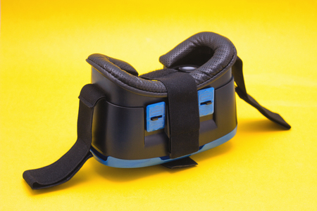Modern blue glasses of virtual reality for smartphone and phone on yellow background, close-up, technologyの写真素材