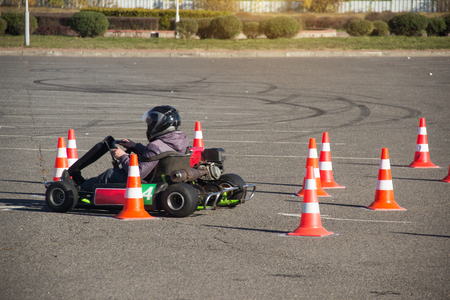 Go-kart competitions, go-kart driver drives a kart, close-up, rushes to the finish, winner, championship, activityの写真素材