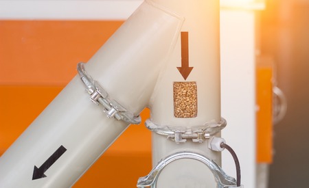 Modern plant for the production of grain and food cereals, grain pipeline moves into the equipment for its processing, close-up, food industry, the manufacture of food grains, equipmentの写真素材
