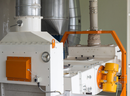 Modern new equipment at the plant for the processing of grain, cleaning of grain from litter and foreign debris, industry, processingの写真素材