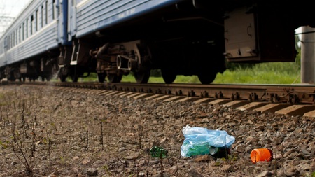 Rubbish on the railway thrown out of the train window, pollution, trash bag, Railway and litterの写真素材