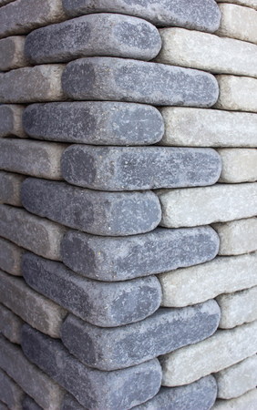 Modern brown brick column, background texture, closeupの写真素材