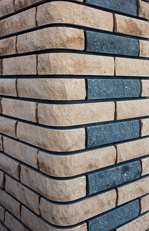 Modern brown brick column, background texture, closeupの写真素材