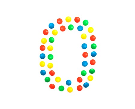 Children's numbers laid out from a multi-colored mosaic figure number 0の写真素材