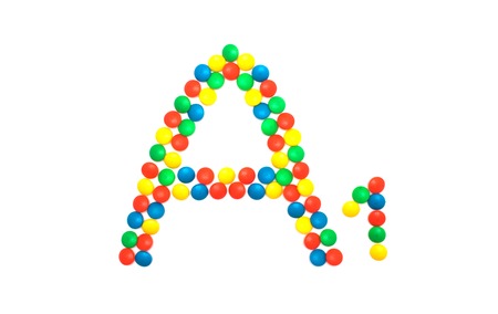 Multi-colored vitamins pills that are lined with the letter Vitamin A1, close-up, medicamentの写真素材