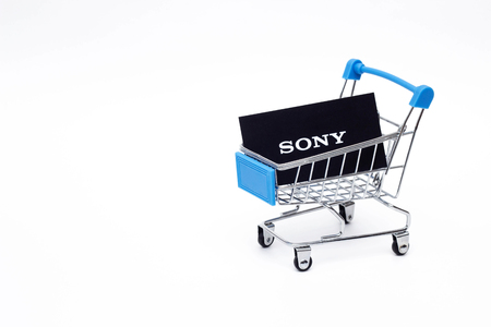 BOBRUISK, BELARUS - JANUARY 30, 2019: Shopping cart on a white background in which the business card of the corporation SONY, the brand, businessのeditorial素材