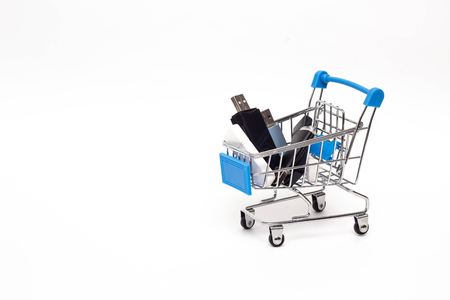 Shopping cart in which you can find flash drives with information, purchase information, copy space, productの写真素材