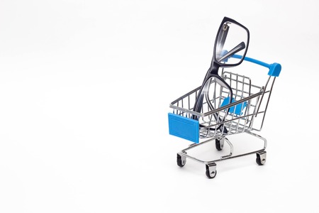 Shopping cart in which the glasses for sight, the purchase of glasses, ophthalmologyの写真素材
