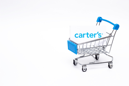 BOBRUISK, BELARUS - JANUARY 30, 2019: Shopping trolley on a white background online store, marketplace Carters, internationalのeditorial素材