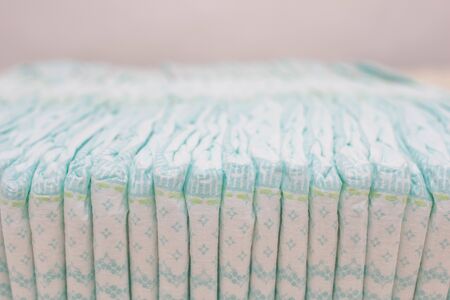 Baby diapers absorbing moisture and protecting against leakage, comfort of movement, close-upの写真素材