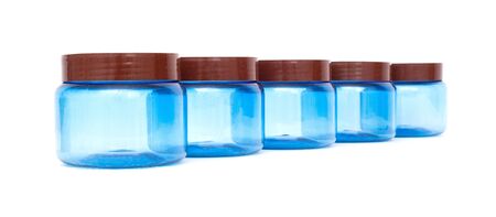 Blue plastic jars on a white background isolate, polyethylene terephthalateの写真素材
