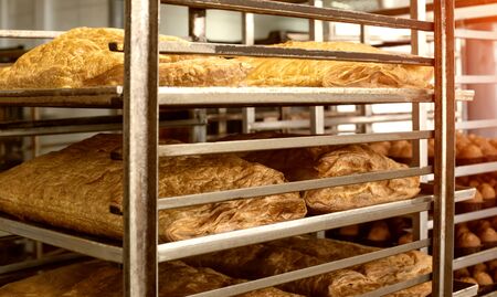 Preparation from puff pastry pastries for cake. Big cake at the pastry production, bakery products, biscuitの写真素材