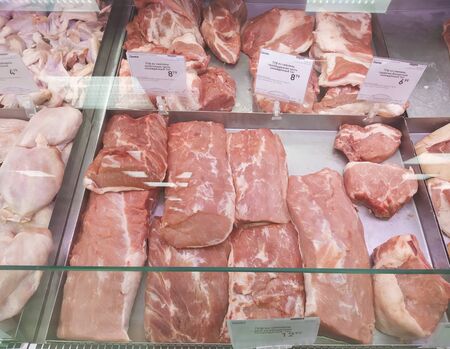 Bobruisk Belarus 28 08 2019: Selling pork meat in a shop window, freshnessのeditorial素材