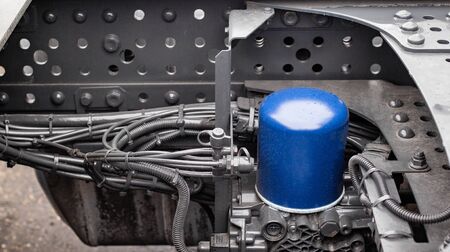 Coarse fuel filter of a truck. Diesel fuel cleaning in a truck, background