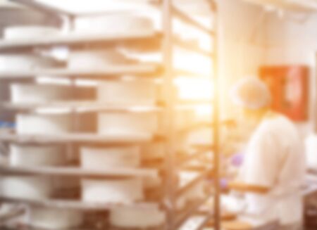 Confectioner makes cakes and pies in the confectionery industry, sunlight, cake blank, confectionary shopの写真素材