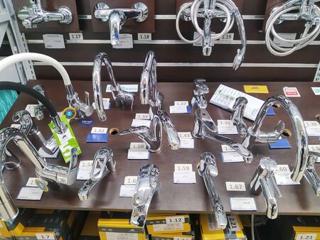Bobruisk Belarus 19.09.2019: Sale of water taps in a plumbing store, sanitary engineeringのeditorial素材