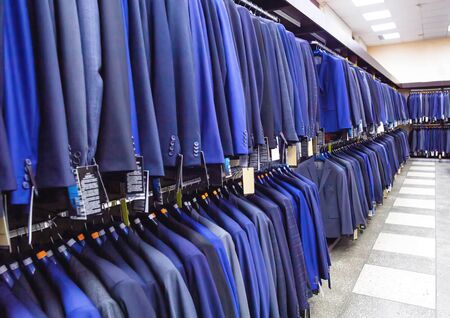 Sale of stylish and fashionable business suits and jackets for business style, backgroundの写真素材
