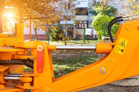 Powerful hydraulic pumps that stand in the bucket of an excavator, industry, close-up