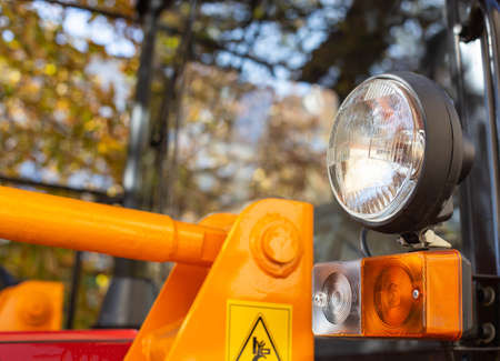 headlights and turn signals on agricultural machinery. Hazard warning lights, industry