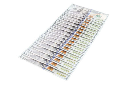100 dollar bills laid out on a white background. Economics and finance concept, shopping