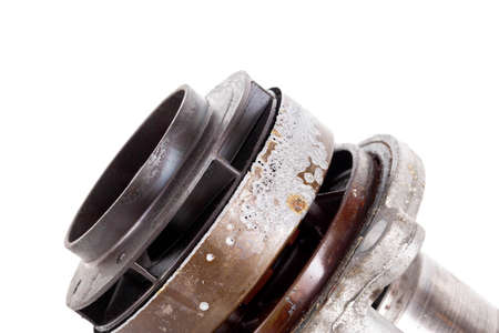Corrosion and sinkholes on a spent car pump out of order, on a white background, isolate. Mechanical