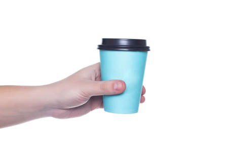 Man holding a turquoise coffee cup on a white background, isolate. close-upの写真素材