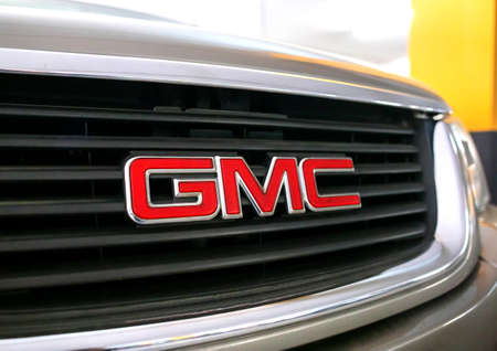 MINSK, BELARUS 07.10.19: GMC car emblem on the car hood. Concept of brand and quality cars,...