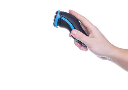 Man holding an electric shaver on a white background, isolate. close up, trimming