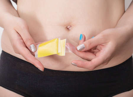 Yellow plaster for slimming in the abdomen for body shaping, taking into account the anatomical...