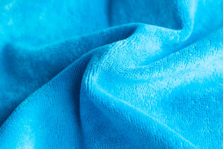 Background from blue velvet fabric, macro, classical Classical