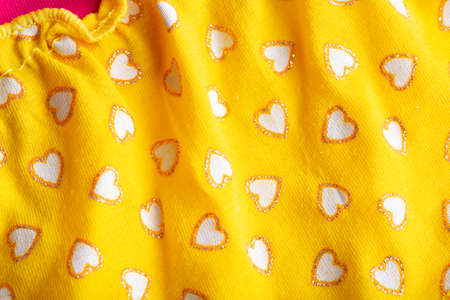 Children's bright colorful dress, background, close-up