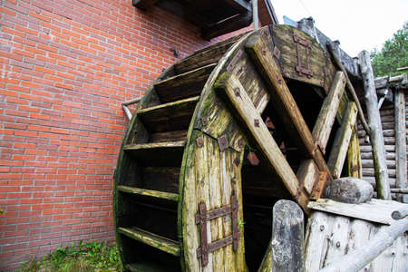 Old wooden water mill, antique style, background