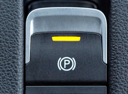 Car button for electronic handbrake. Parking brake, macro