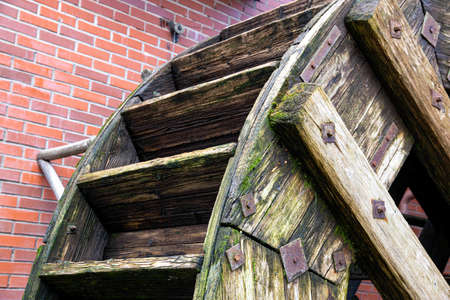 Old wooden water mill, antique style, background