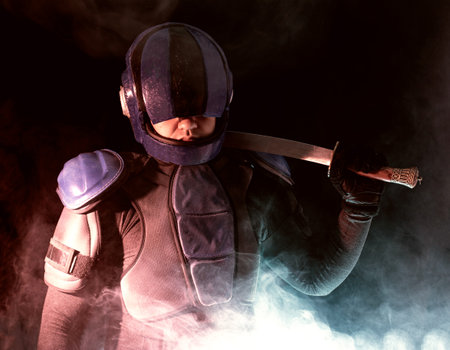 Robot cop pulls out short samurai sword and swings it, he stands in dark with smoke, fume. Halfman looks at camera. Futuristic science fiction scene. Red blue light blinks. Law and order concept. World of tomorrow. Like a robocop, judge dredd, fifth element, matrix or blade runner movieの写真素材