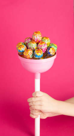 BOBRUISK, BELARUS 22.01.22: A large candy brand chupa chups consisting of small candies on a pink backgroundのeditorial素材