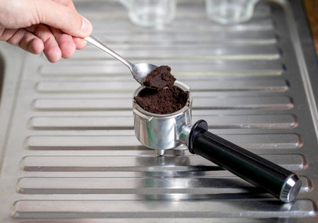 Waste coffee in a rotor coffee machine. Maintenance and cleaning concept for coffee maker partsの写真素材