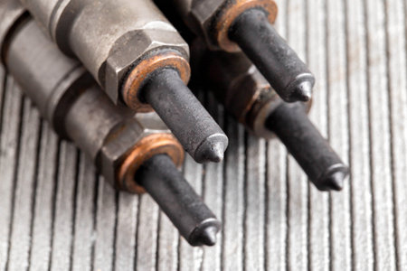 Needles and nozzles on nozzles from a diesel engine. Deterioration of the fuel system of the car