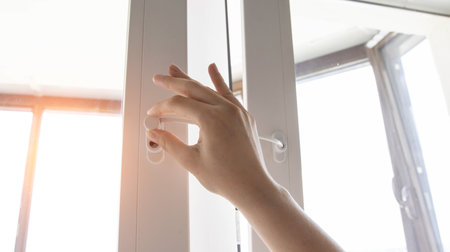 Protection against children on a plastic pvc window. Safety from children falling from the window....