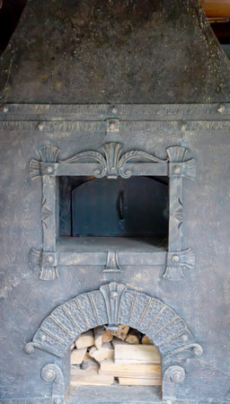 forged handmade metal stove for wood burning, close-upの写真素材