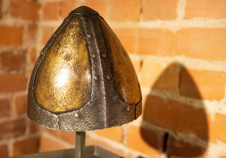 Protective headdress of the Middle Ages Norman helmet.
