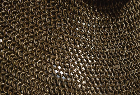 Protective old military chain mail, close-up. Mail made of round metal rods for the protection of a warrior, geometricの写真素材
