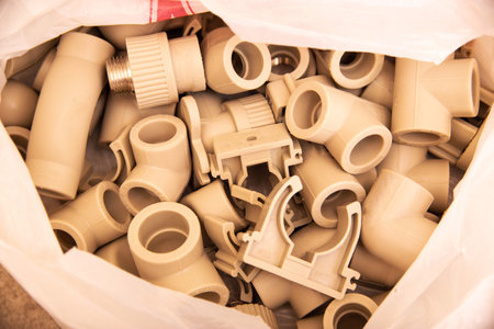 water fittings for plastic pipes in plumbingの写真素材