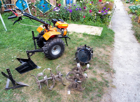 A set of attachments, hiller, milling cutters and lugs. Motoblock for agricultural work. Purchase and running-in of a walk-behind tractor.の写真素材