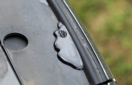 Anti-corrosive leakage in the engine compartment after treatment with an anti-corrosion coating on the car, protecting metal from corrosionの写真素材